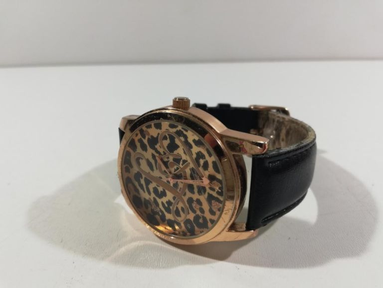 zegarek-panterka-skorzany-pasek-ksztalt-koperty-okragla
