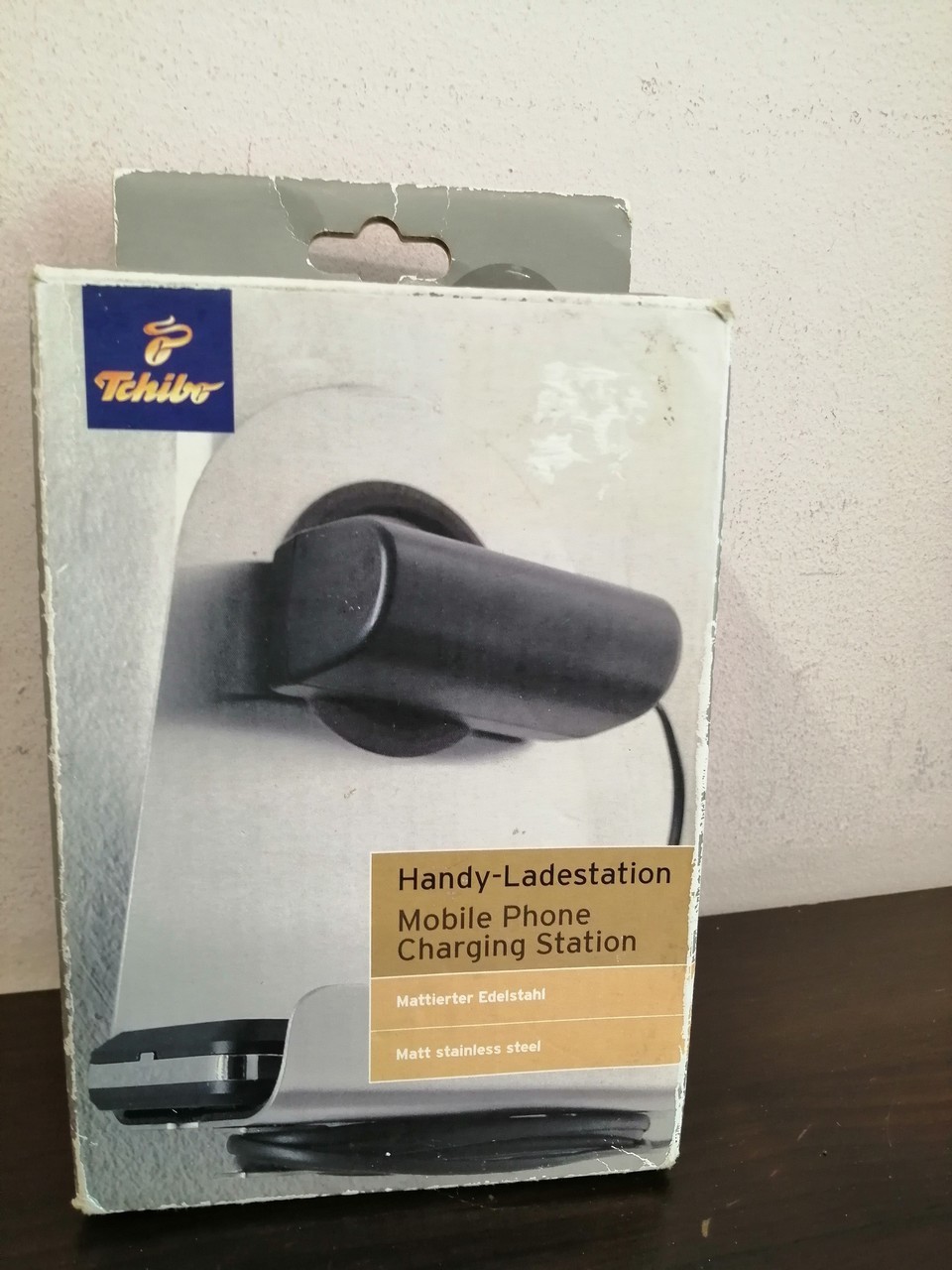 polka-na-ladowarke-do-telefonu-tchibo-stalowa-stan-uzywany