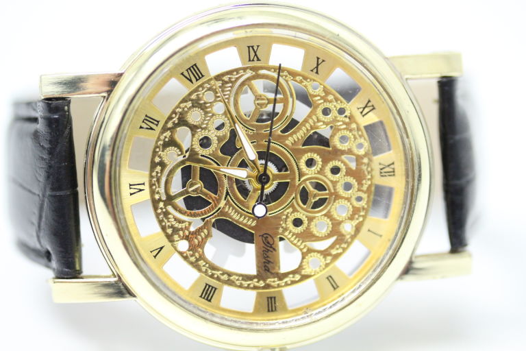 MĘSKI ZEGAREK TYPU SKELETON ZŁOTY PASEK QUARTZ