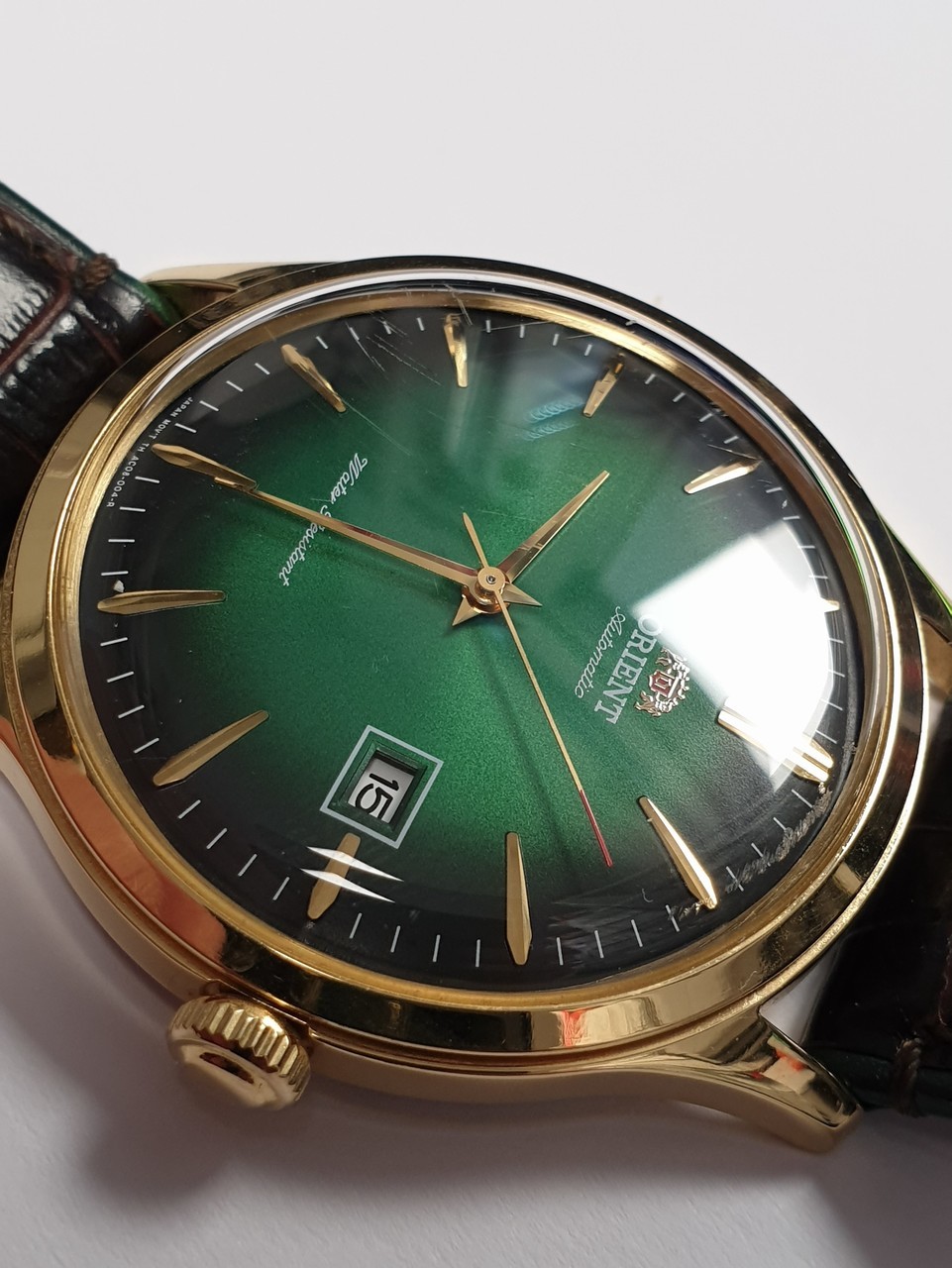 zegarek-orient-bambino-v4-zielony-klasyk-ksztalt-koperty-owalna