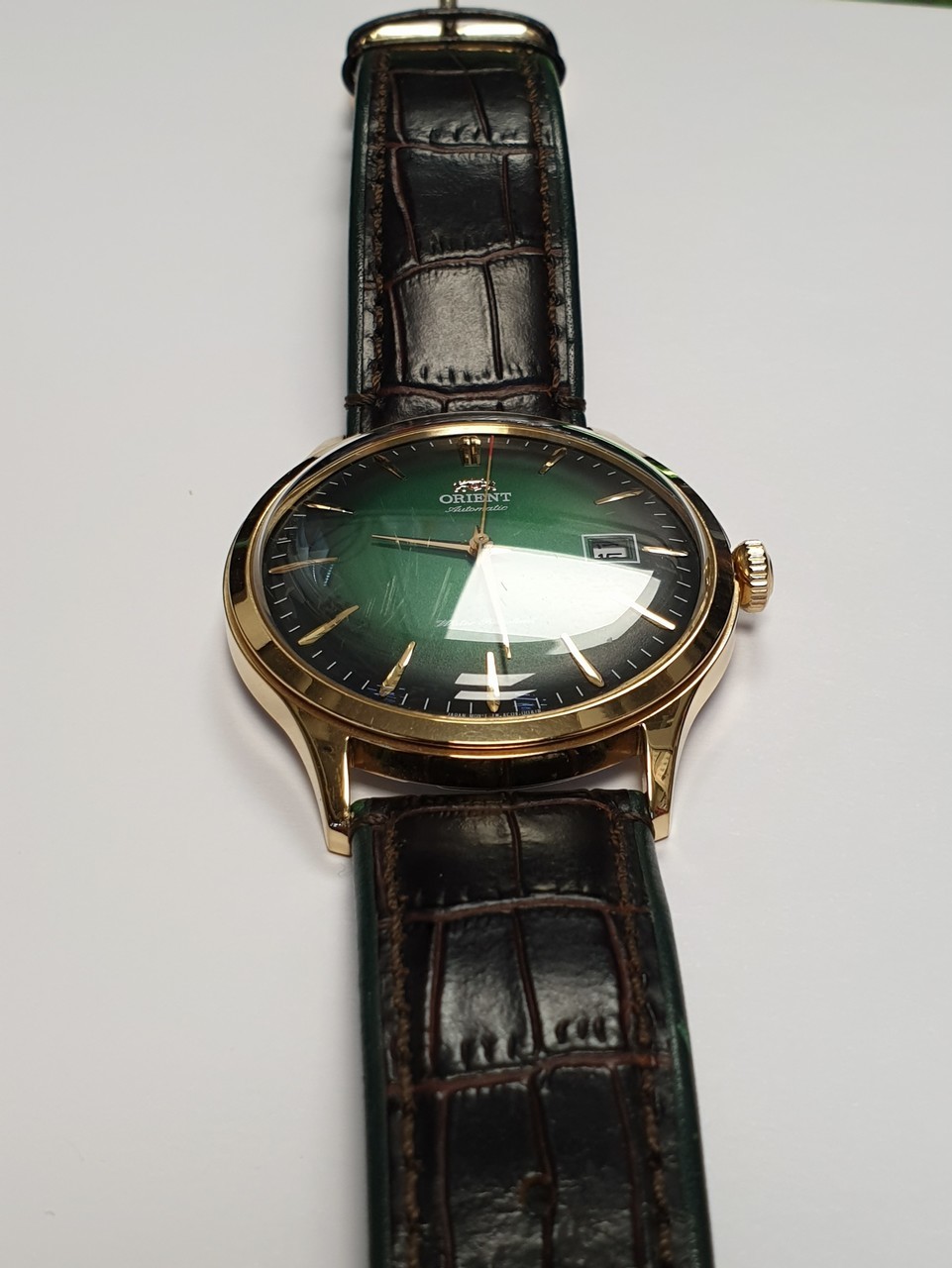 zegarek-orient-bambino-v4-zielony-klasyk-funkcje-datownik