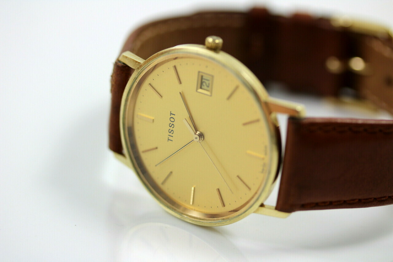 piekny-meski-zloty-zegarek-tissot-14k-at-cudo-marszalkowska-60-warszawa