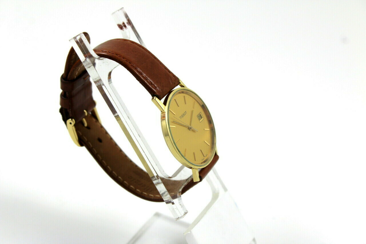 piekny-meski-zloty-zegarek-tissot-14k-at-cudo-rodzaj-analogowe