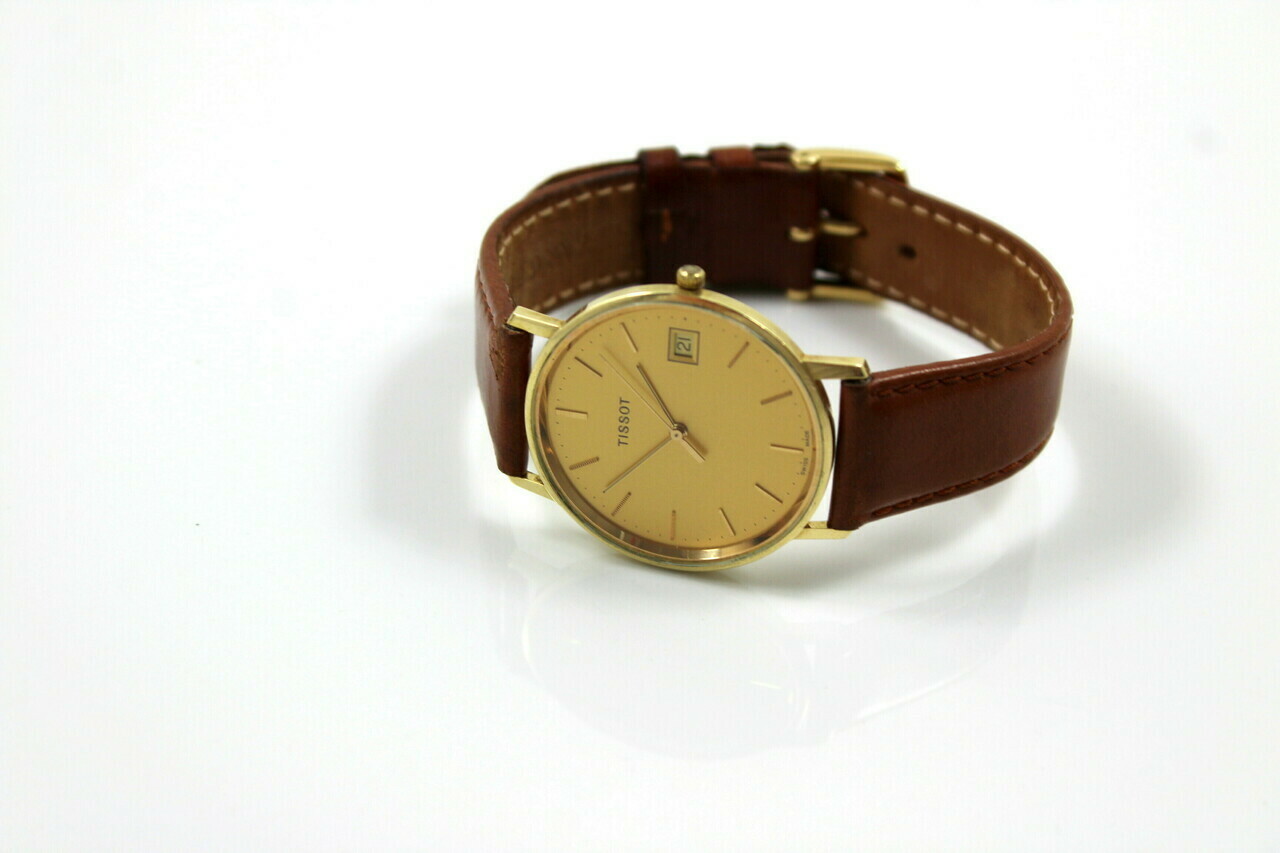 piekny-meski-zloty-zegarek-tissot-14k-at-cudo-ksztalt-koperty-okragla