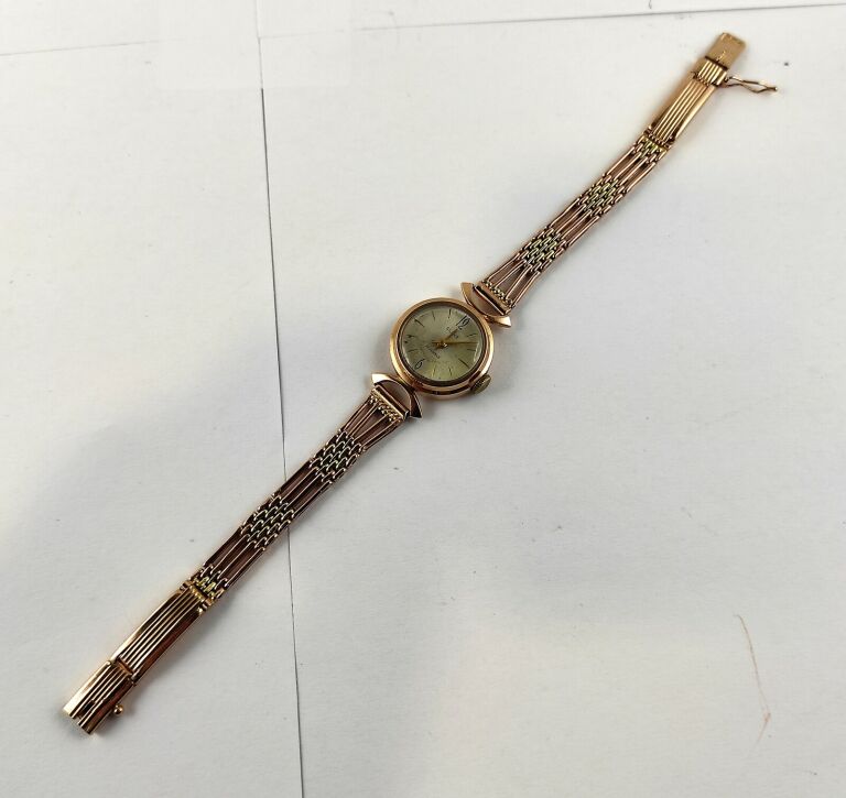 zloty-zegarek-slava-17-jewels-583-2144g-zsrr-ksztalt-koperty-okragla