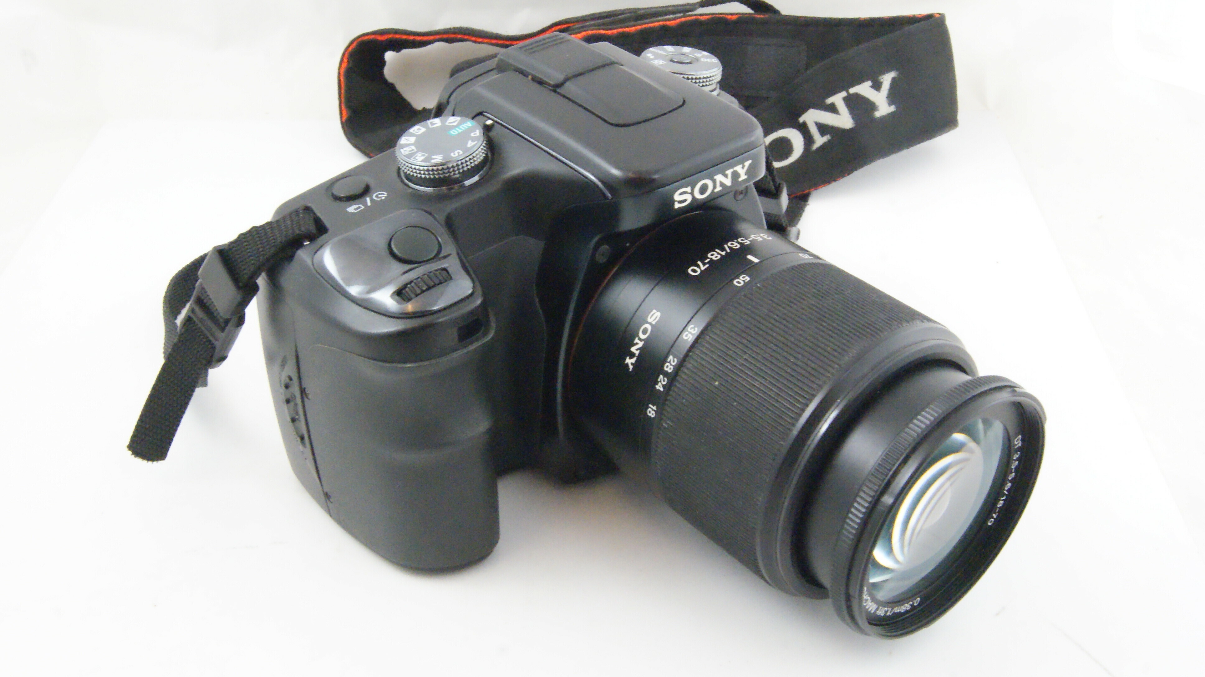 aparat-sony-alpha-100-uszkodzony-obiektyw-lad-marka-sony