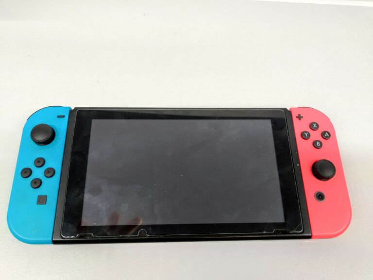 KONSOLA NINTENDO SWITCH HAC-001 USZKODZONA BATERI