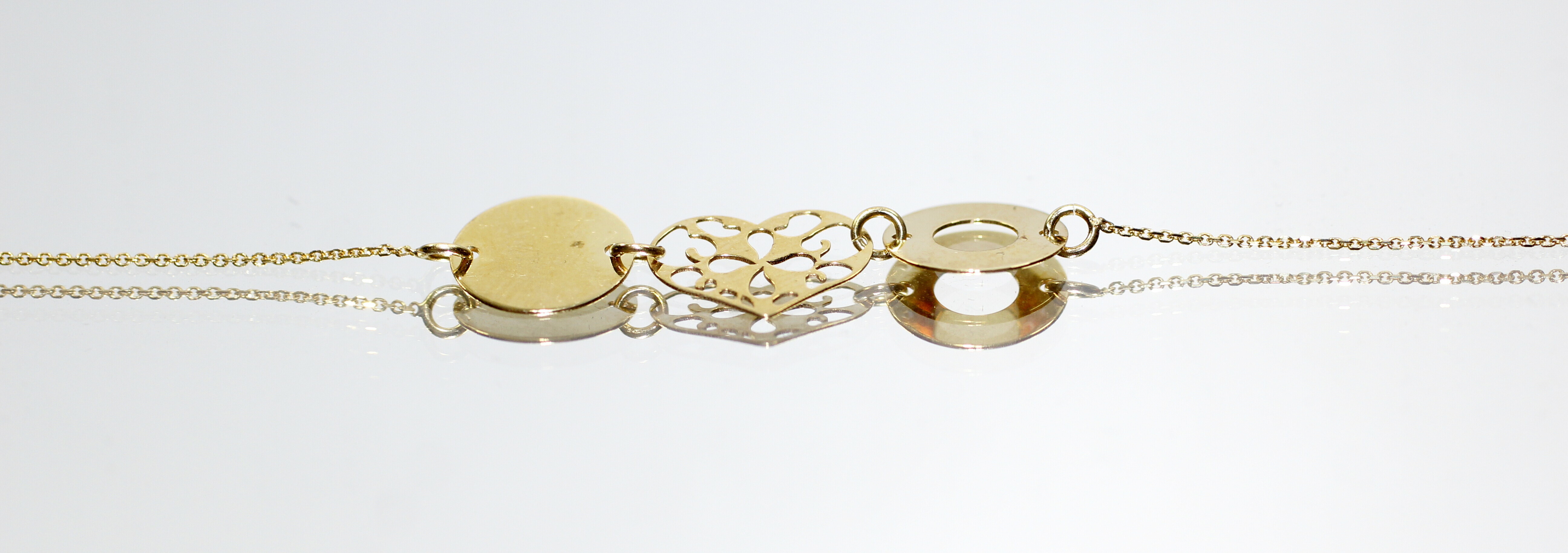 nowa-zlota-celebrytka-333-098gr-kolo-serce-obrecz-ean-gtin-5900025430446