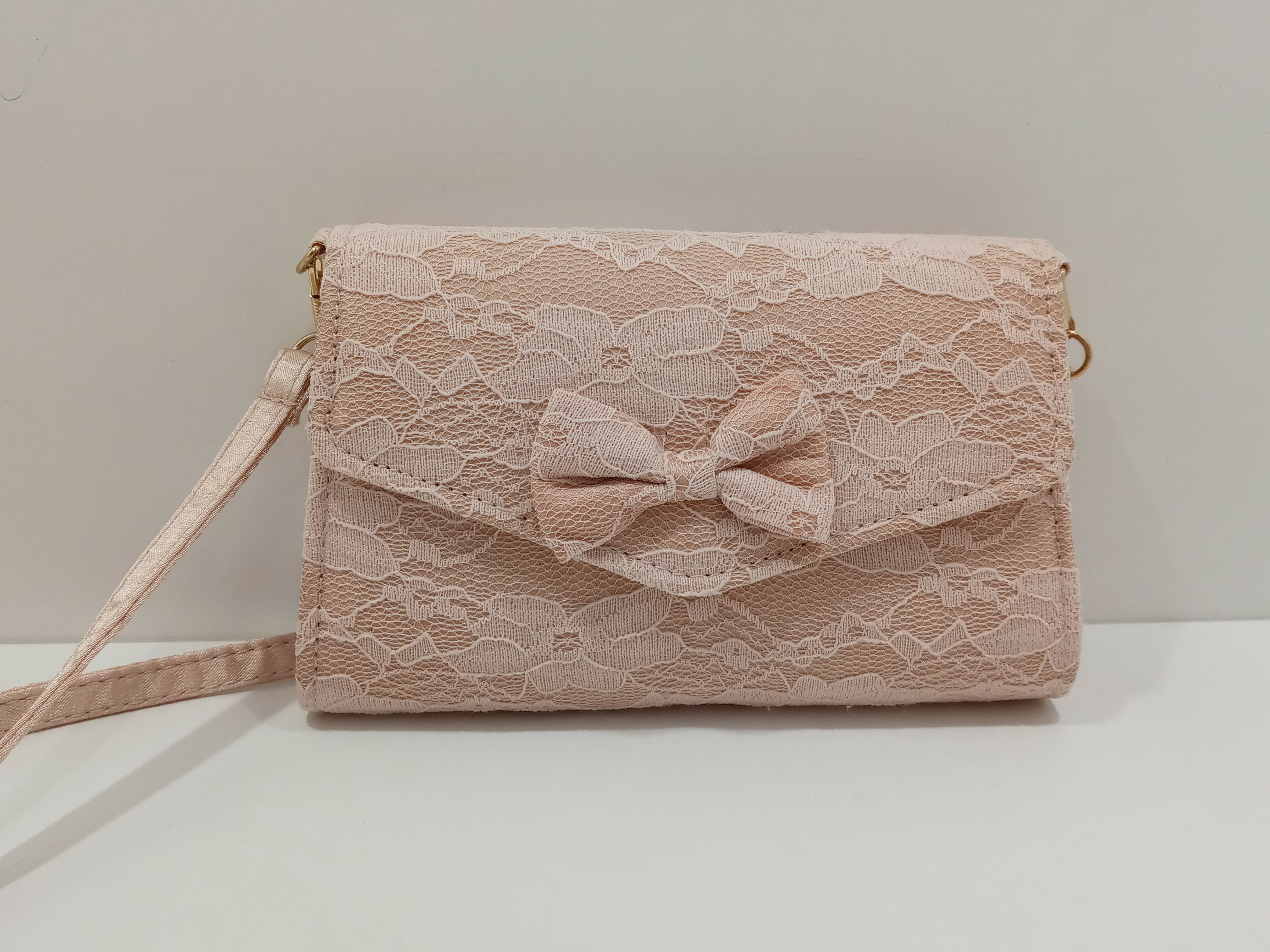 mala-torebeczka-z-kokardka-51015-traugutta-15-radom