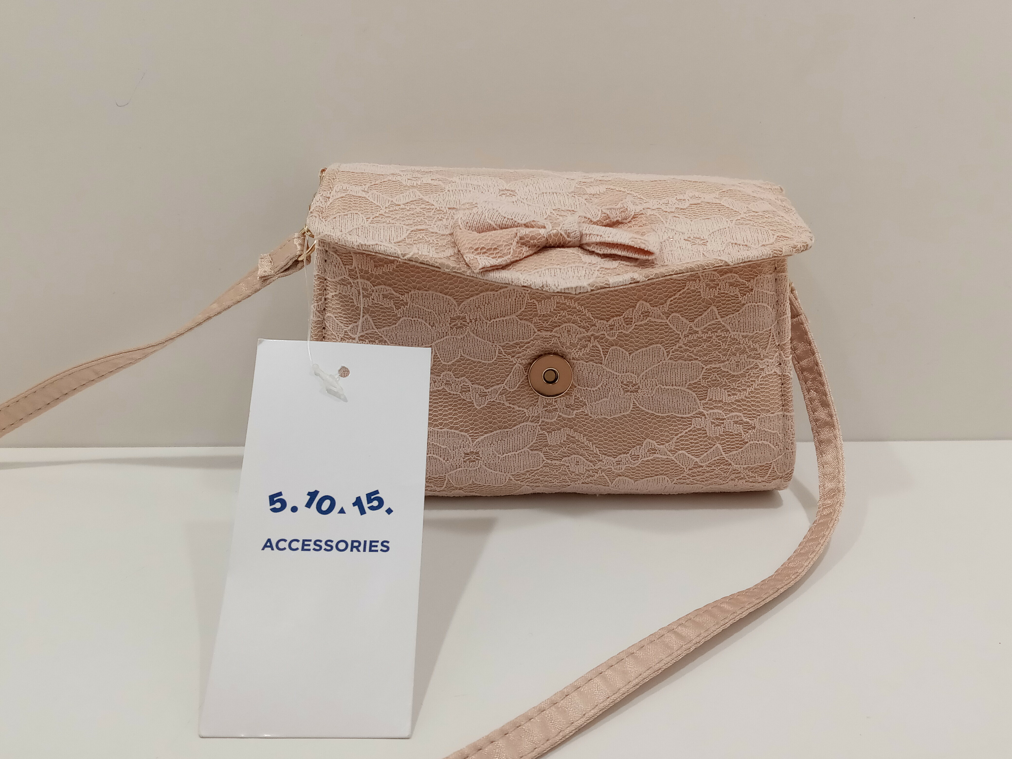 mala-torebeczka-z-kokardka-51015-stan-uzywany