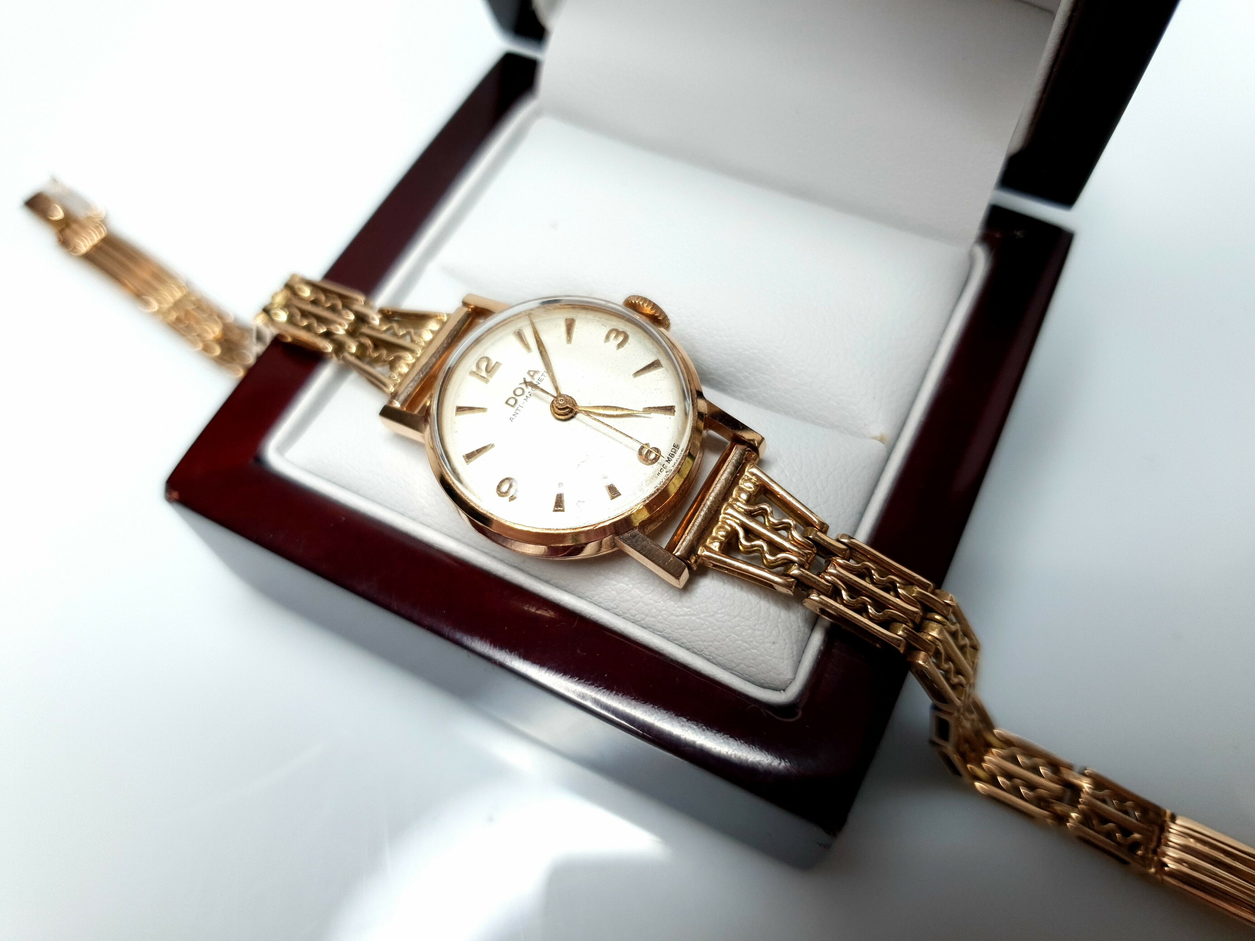 oryginalny-zloty-zegarek-doxa-13716-14k-2318g-ksztalt-koperty-okragla