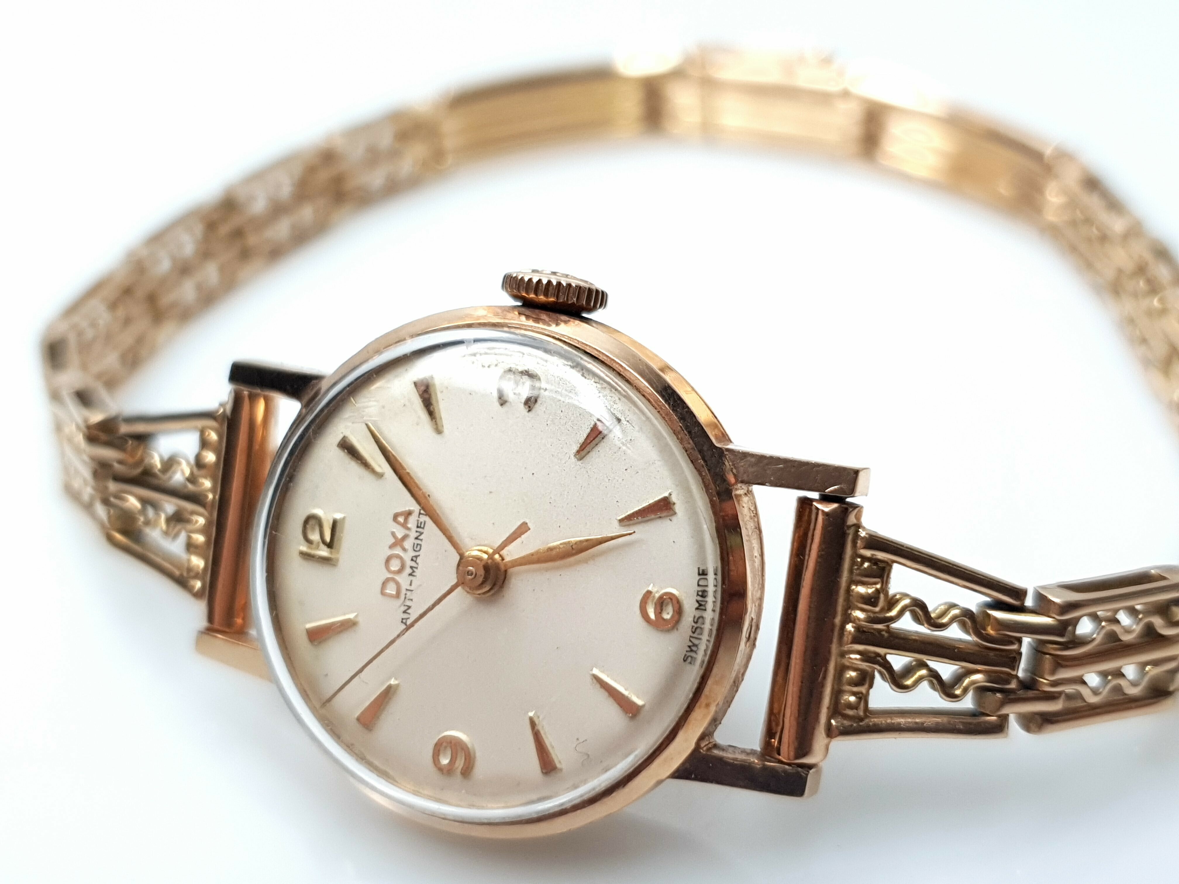 oryginalny-zloty-zegarek-doxa-13716-14k-2318g-marka-doxa