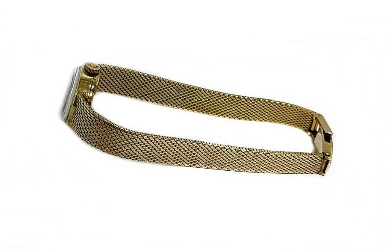 omega-zloty-zegarek-ksztalt-koperty-okragla