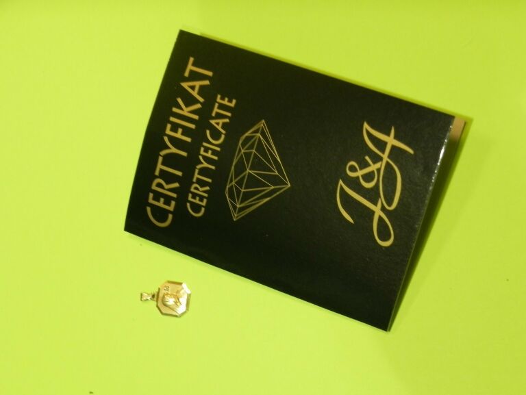 zloto-zlota-zawieszka-proba-585-1-diament-stan-uzywany