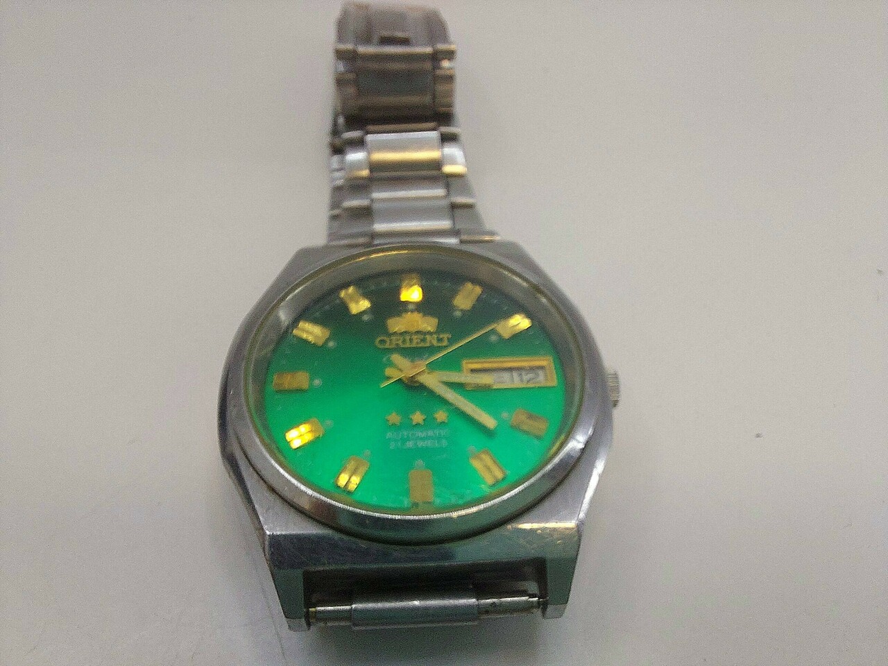 zegarek-orient-l469711-zielony-ksztalt-koperty-okragla