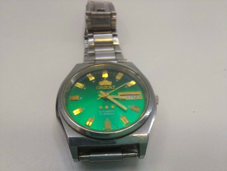 zegarek-orient-l469711-zielony-ksztalt-koperty-okragla