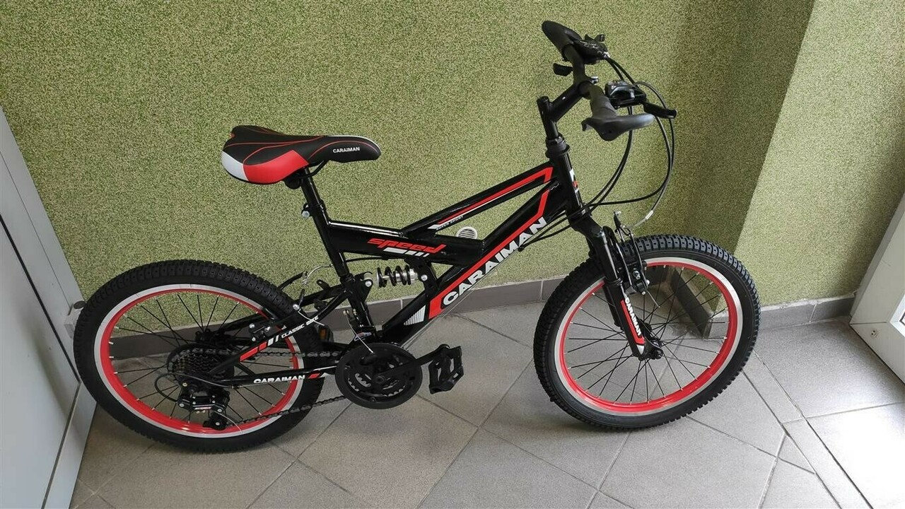rower-caraiman-20cali-z-amortyzacja-21-biegow-plec-dziewczynka