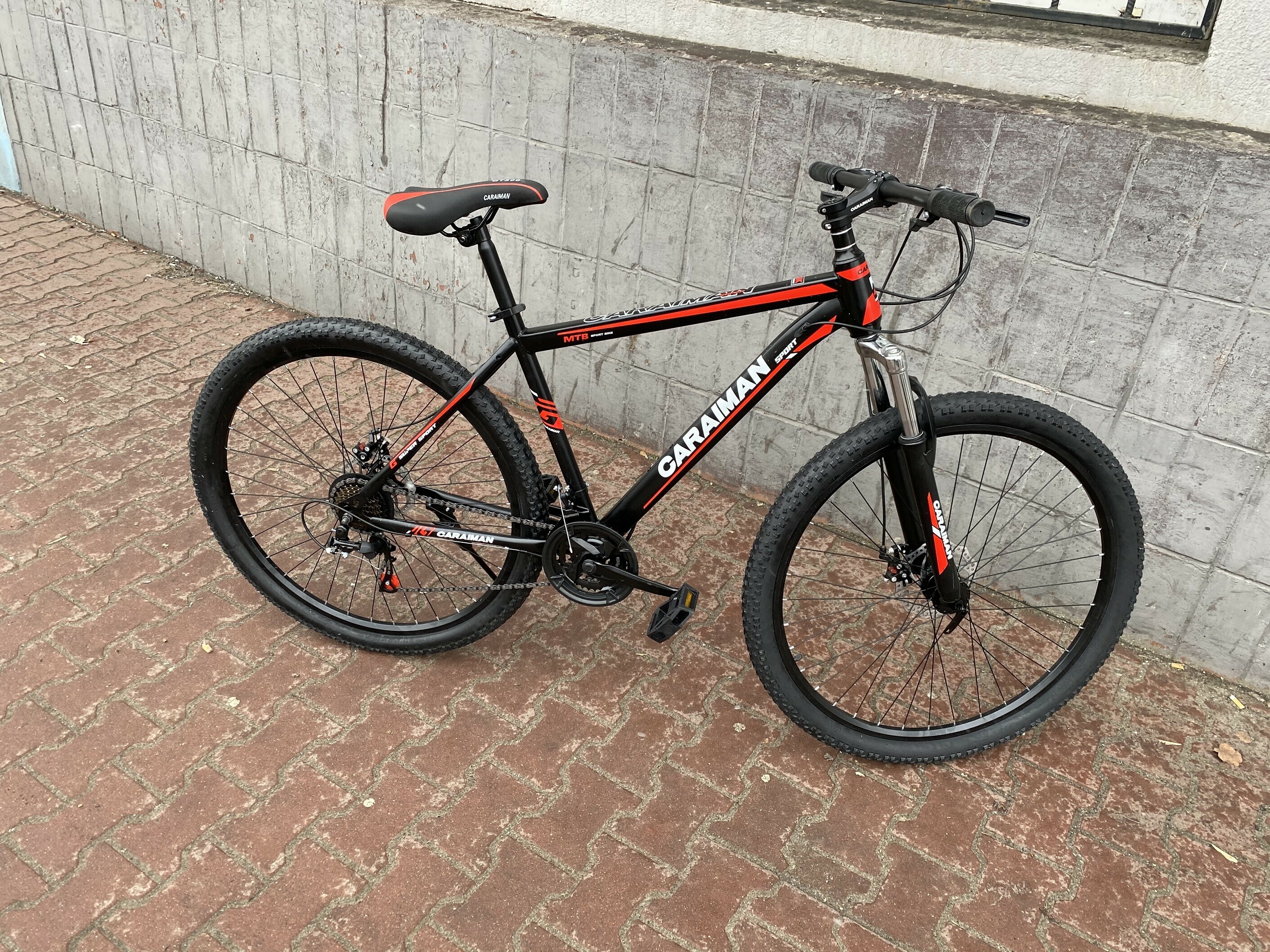 rower-caraiman-29-cali-stalowy-czerwony-plec-kobieta