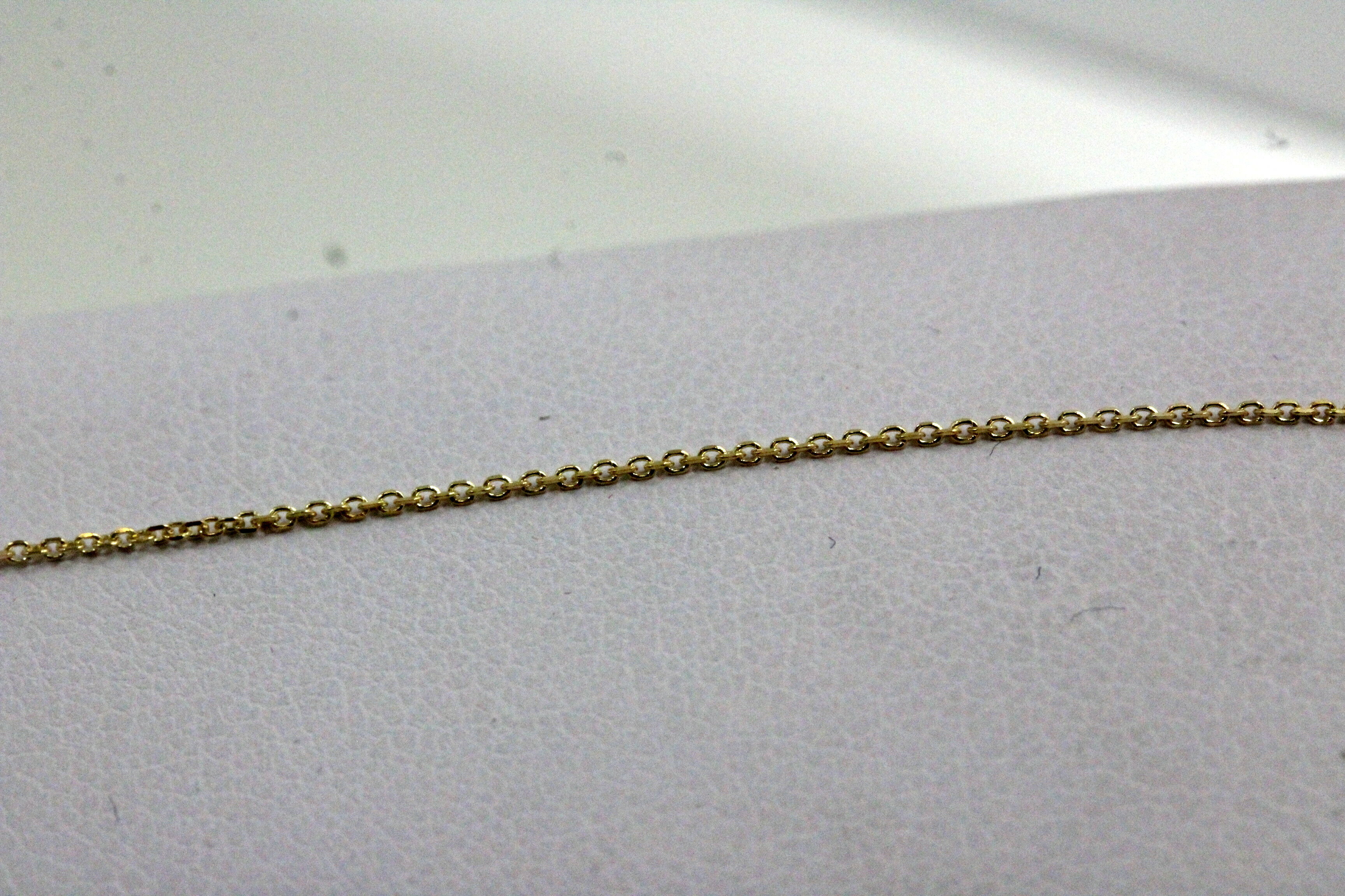 nowa-zlota-bransoletka-333-066g-dwa-okregi-195cm-material-15835-2