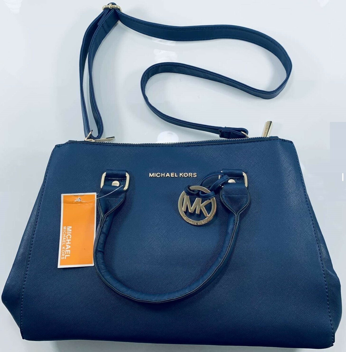 torebka-michael-kors-niebieska-wielkosc-mala-nie-mieszczaca-a4