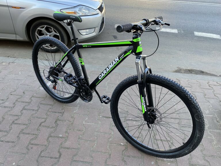 rower-caraiman-29-cali-stalowy-zielony-plec-kobieta