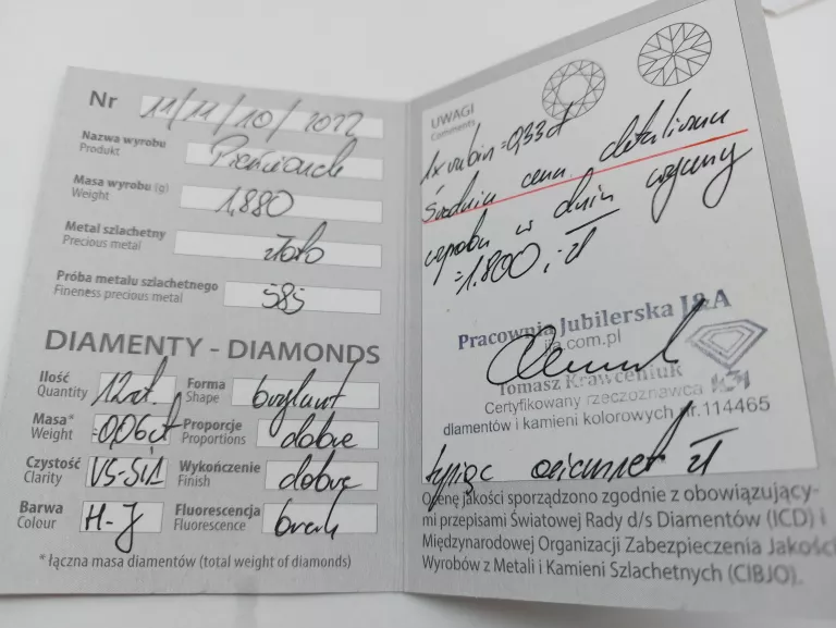 zloty-pierscionek-z-rubinem-i-12-brylantami-585-stan-uzywany