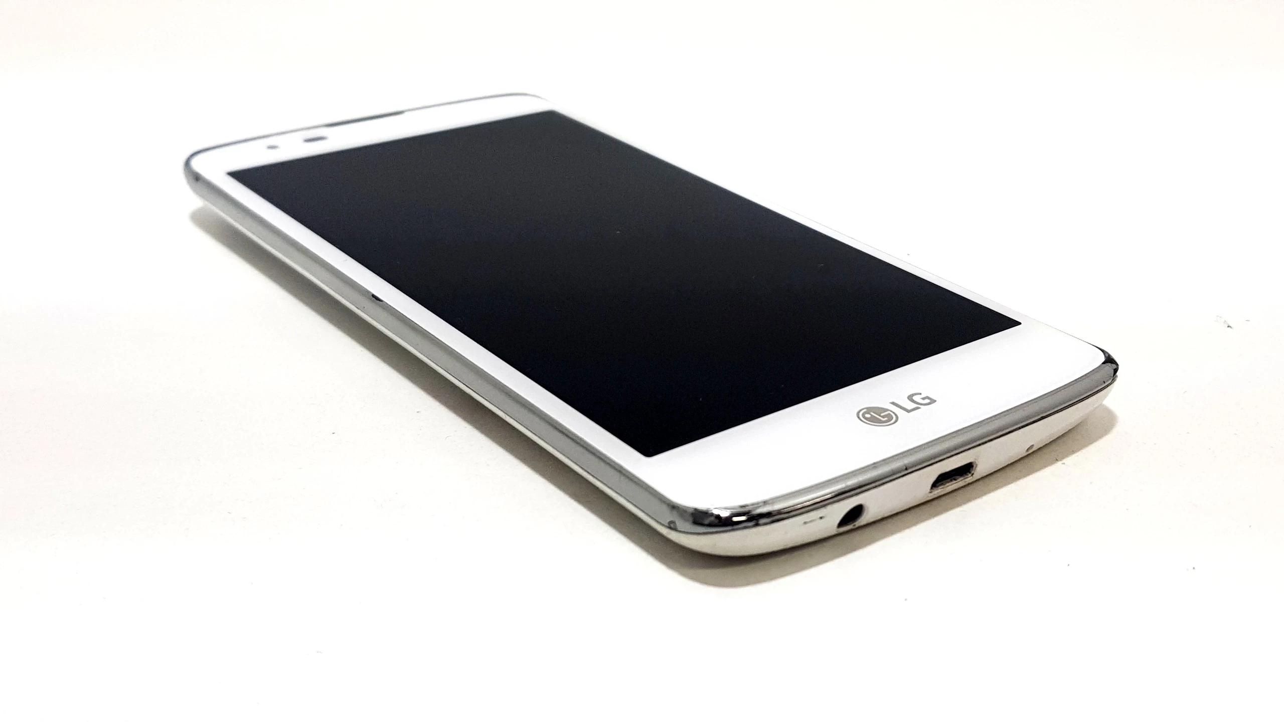 telefon-lg-k8-bialy-uszkodzone-wejscie-sim-typ-202685-212929