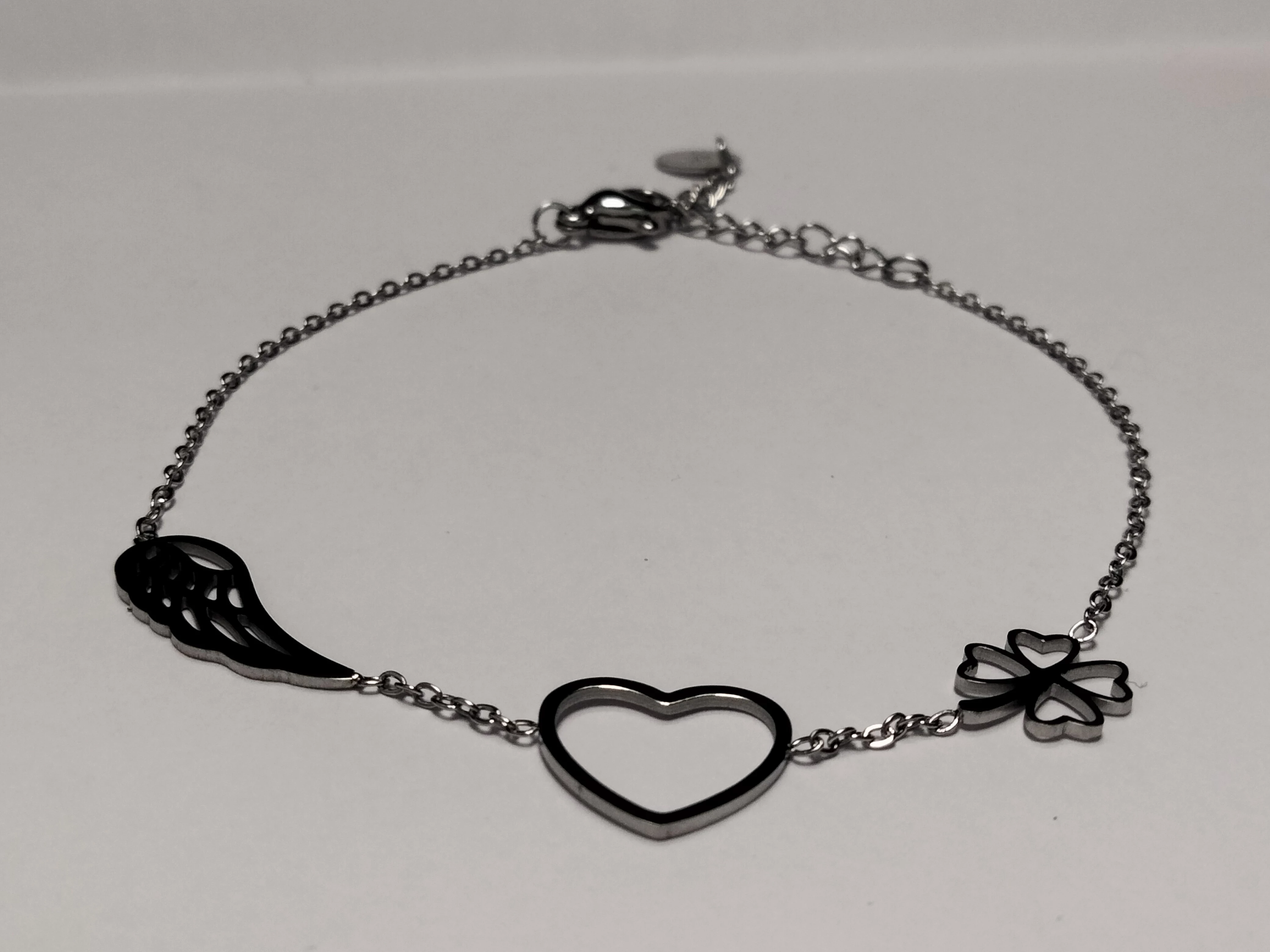 bransoletka-stalowa-serduszko-skrzydelko-koniczyna-marka-inna-marka