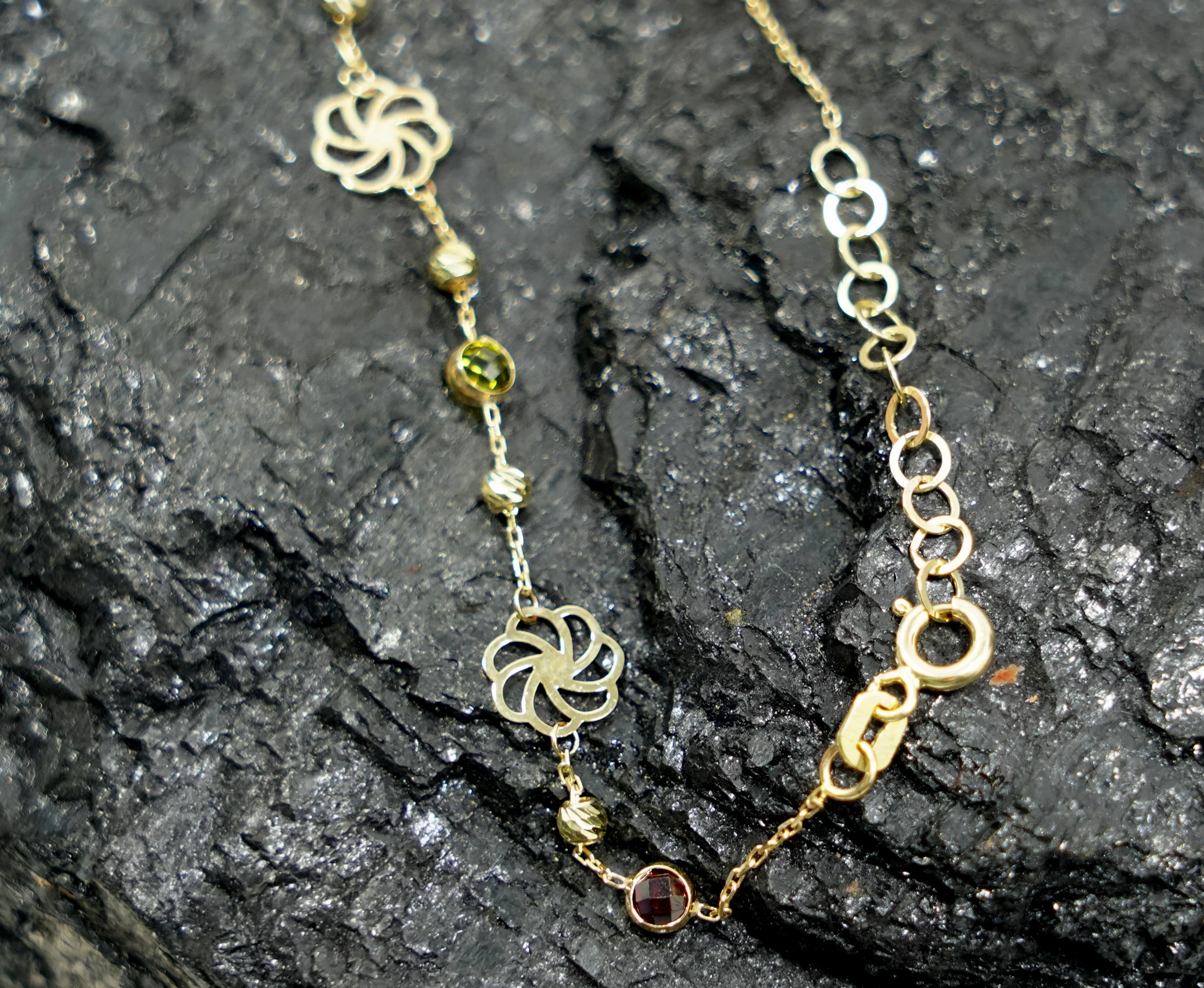 nowa-zlota-brans-333-kwiatuszki-zielone-cyrkonie-kamien-bez-kamienia