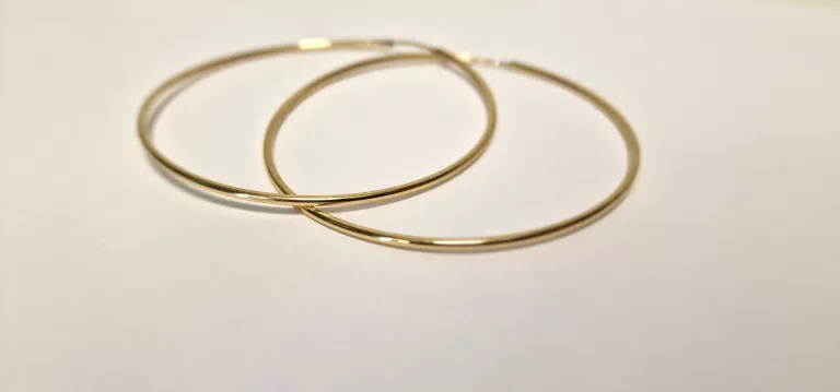 zlote-kolczyki-kola-stan-powystawowy