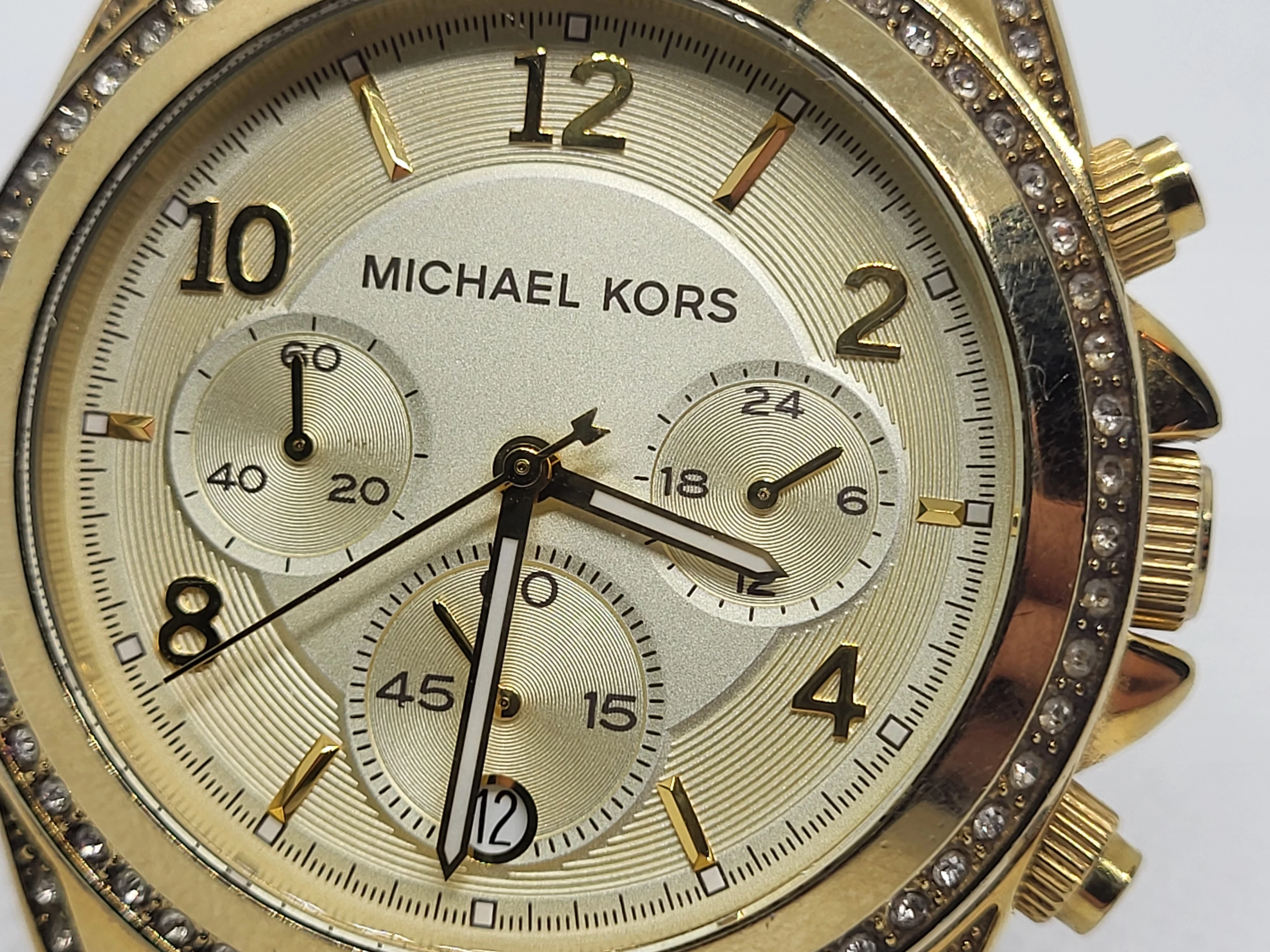 zegarek-damski-michael-kors-mk5166-funkcje-datownik