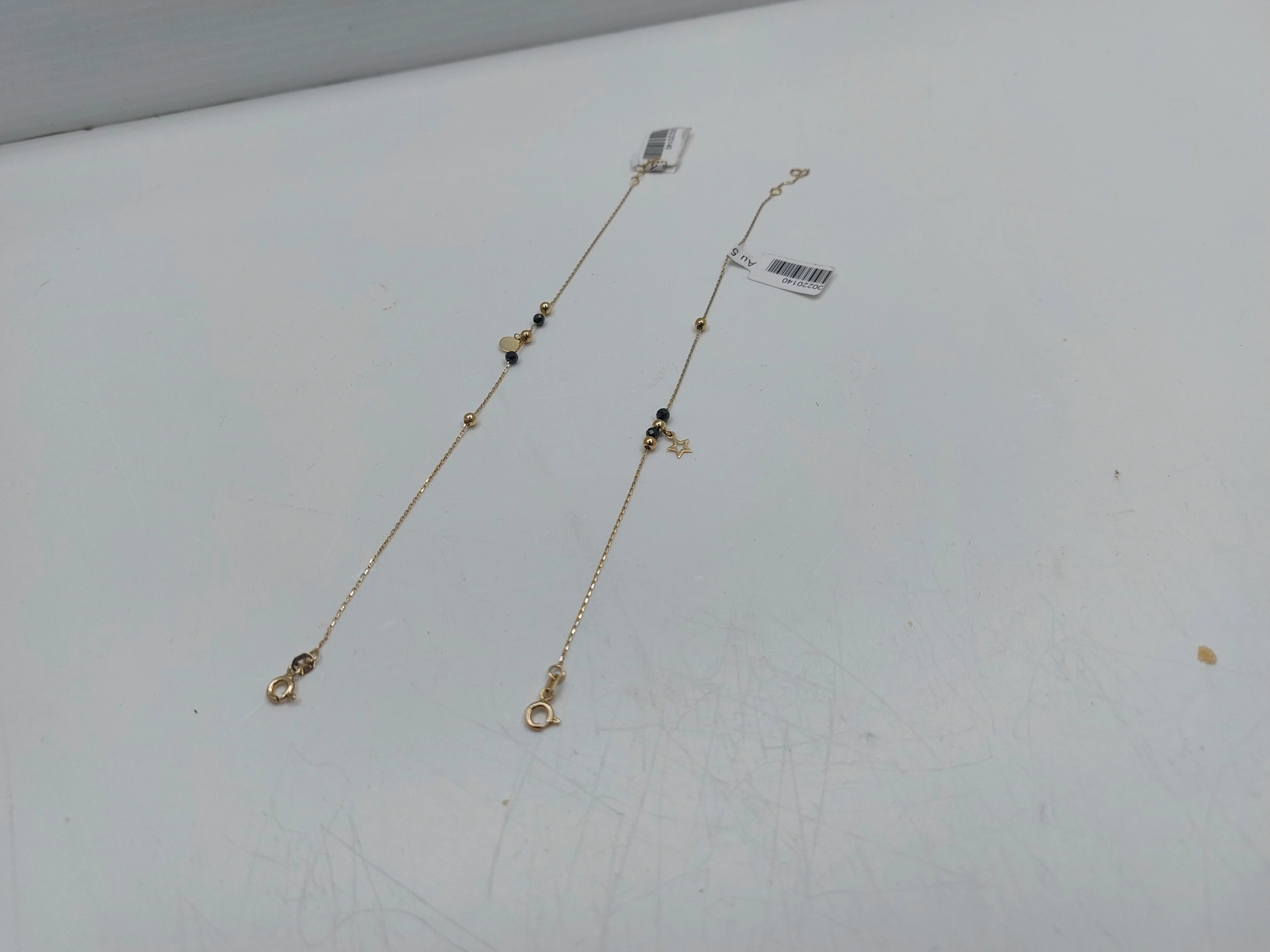 bransoletka-z-czarnymi-kamieniami-i-kulkami-opis-stan-uzywany