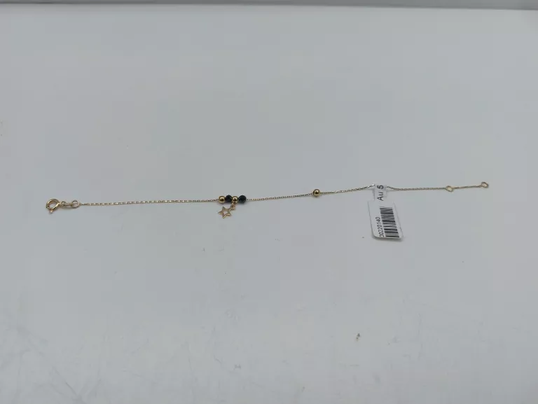 bransoletka-z-czarnymi-kamieniami-i-kulkami-opis-marka-inna-marka