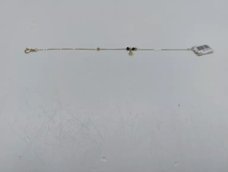 bransoletka-z-czarnymi-kamieniami-i-kulkami-opis-rodzaj-wyrob-jubilerski