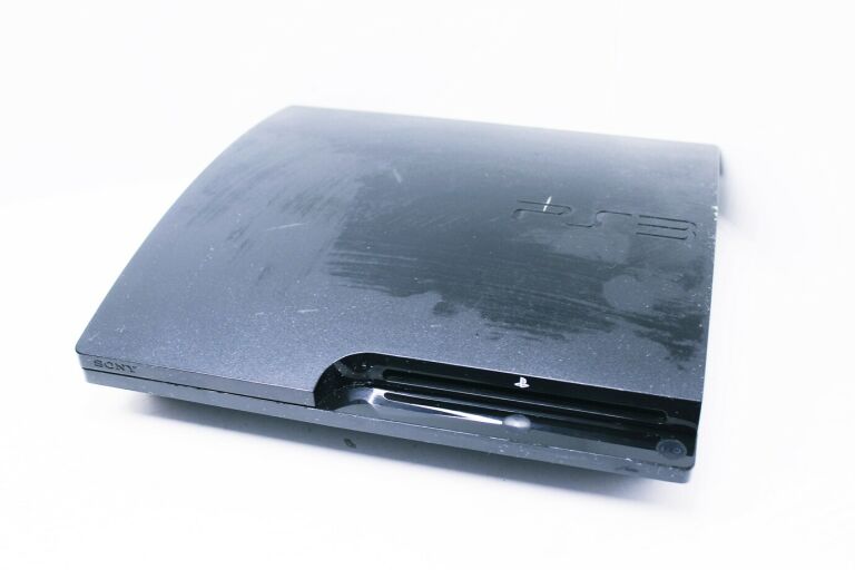 KONSOLA PS3 SLIM CECH-3004B USZKODZONY NAPĘD
