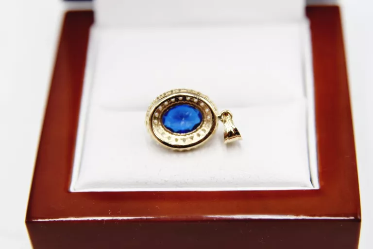 piekna-zlota-zawieszka-z-niebieskim-oczkiem-motyw-inny-ksztalt