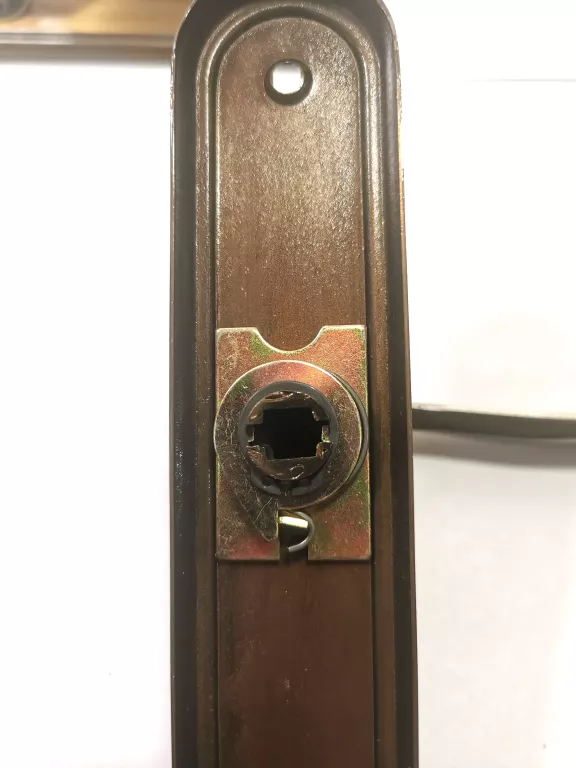 klamka-z-dlugim-szyldem-lyzeczka-mosiadz-platyn-stan-uzywany