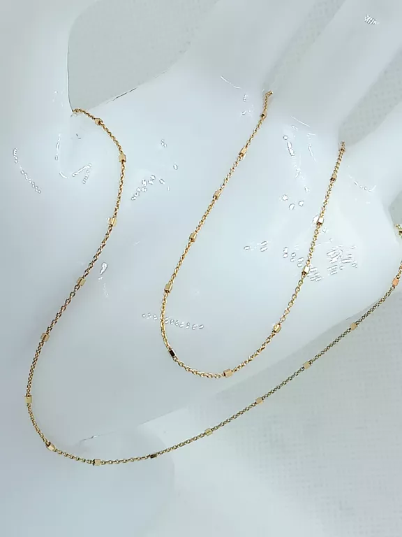 urocza-celebrytka-z-kwadracikami-585-163-g-stan-uzywany