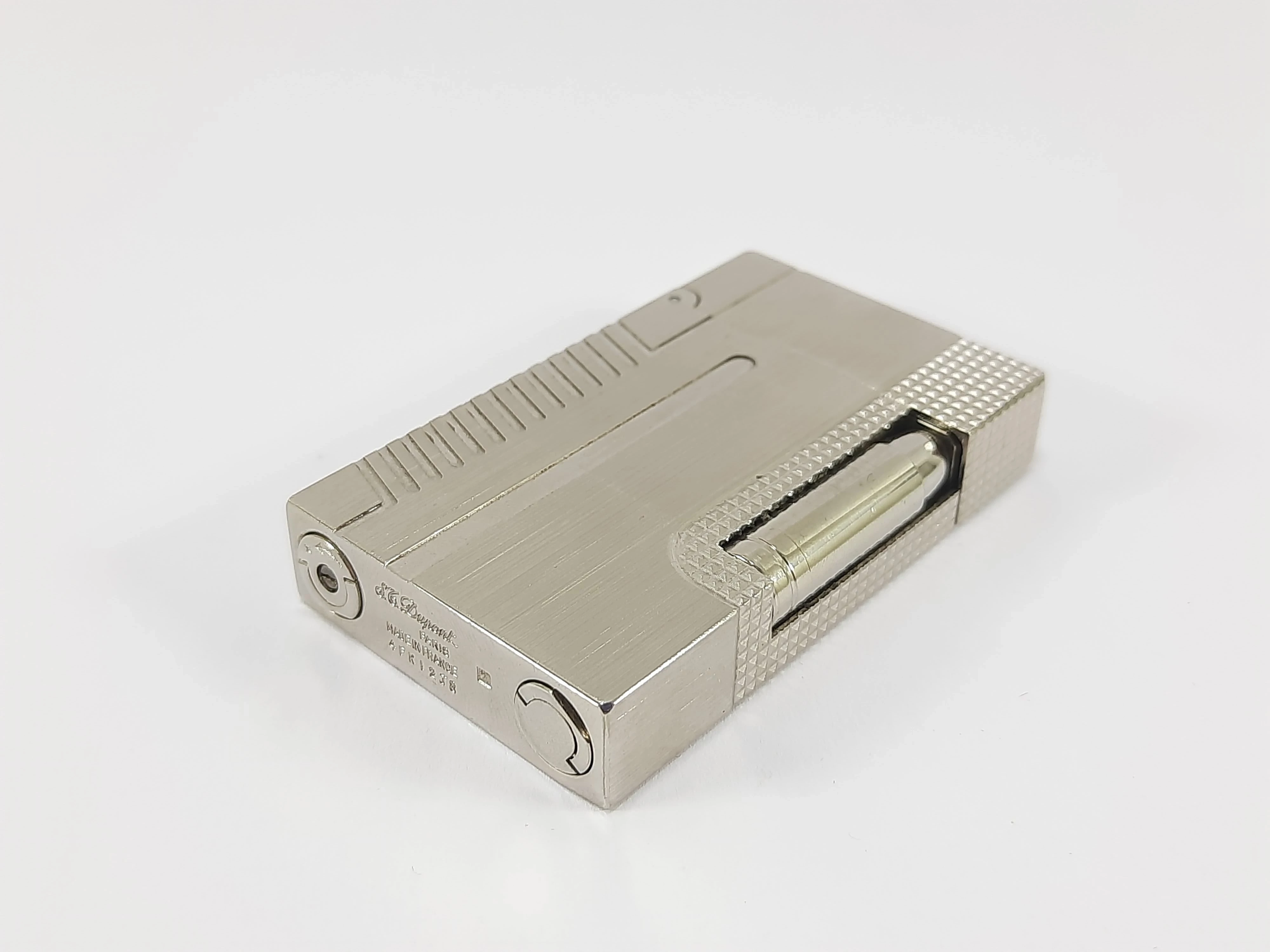 srebrna-zapalniczka-st-dupont-007-glogowska-35a-poznan-ska-x