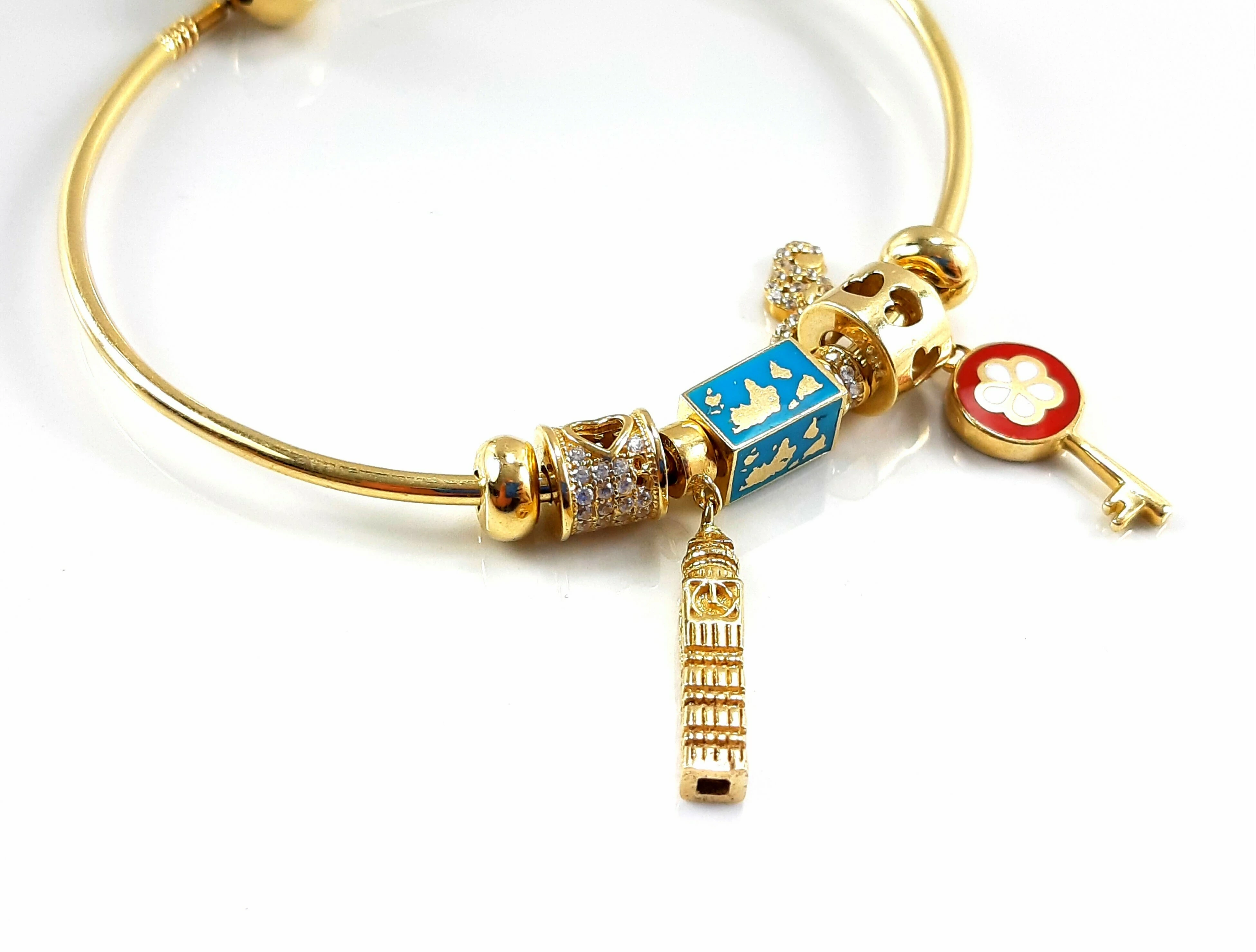 nowa-zlota-bransoletka-ogragla-z-charmsami-585-14k-polwiejska-13-poznan-ska-x