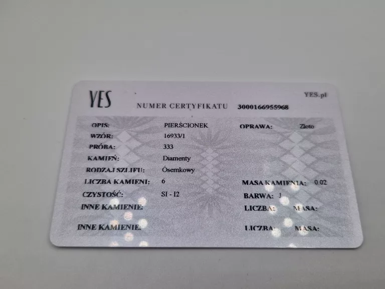 UROCZY ZŁOTY PIERŚCIONEK YES 0,61 G 333 8K R. 13