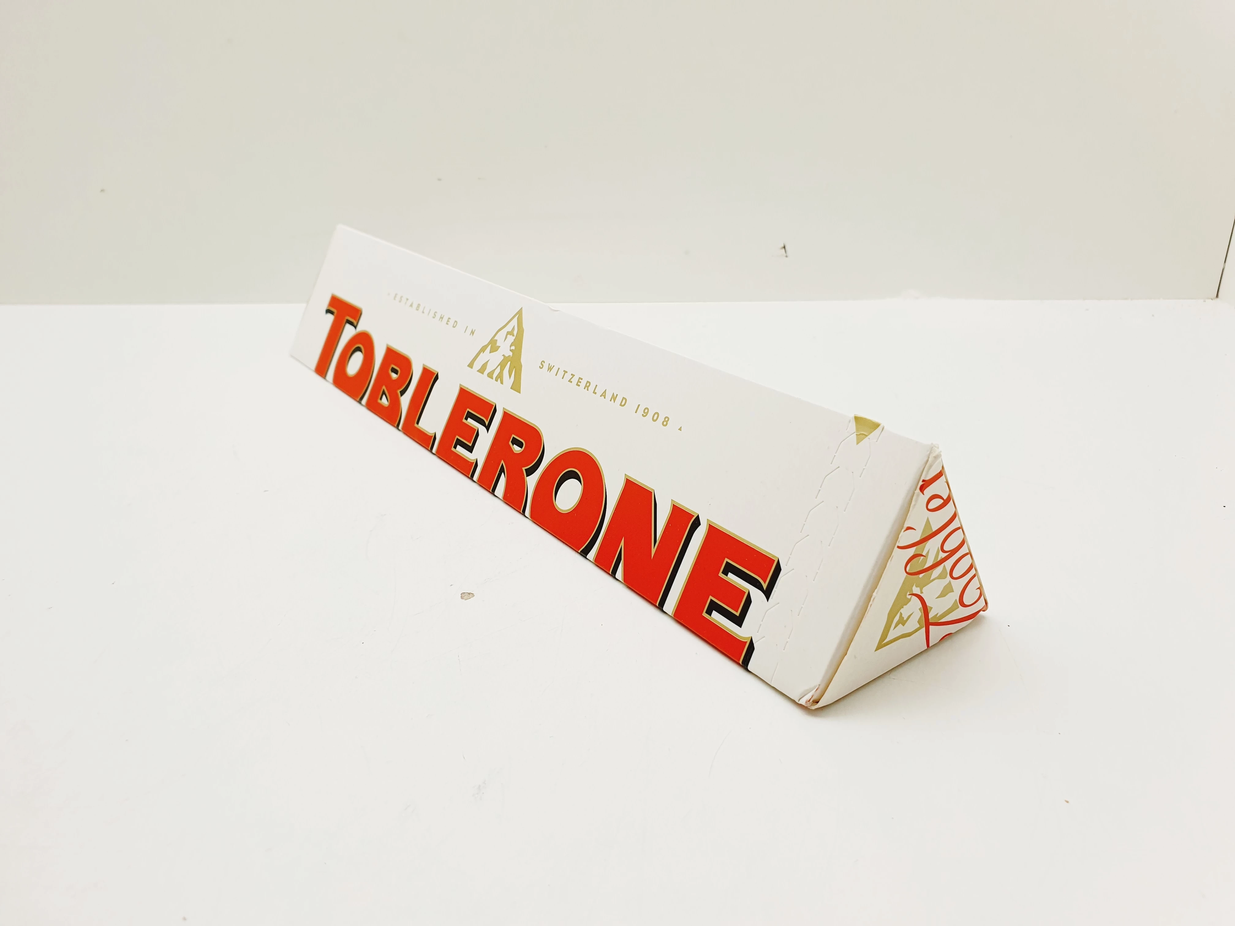 toblerone-of-switzerland-czekolada-biala-migdaly-miod-360g-ean-gtin-7622210496669