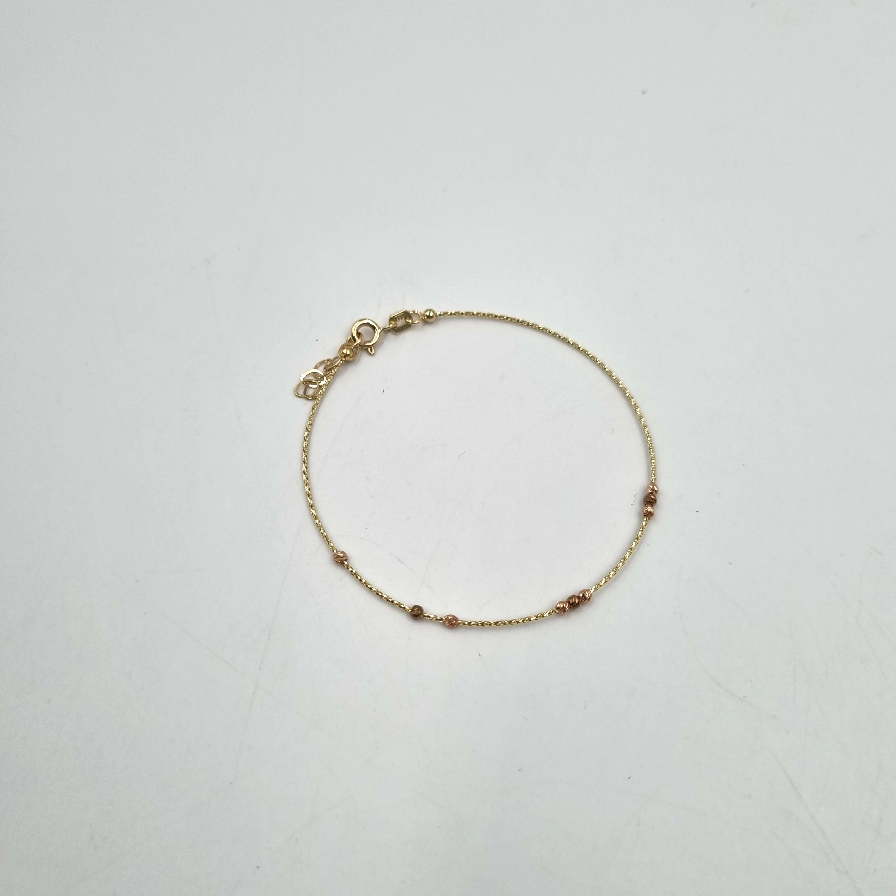 piekna-nowa-zlota-bransoletka-585-088g-kulki-19cm-stan-nowy