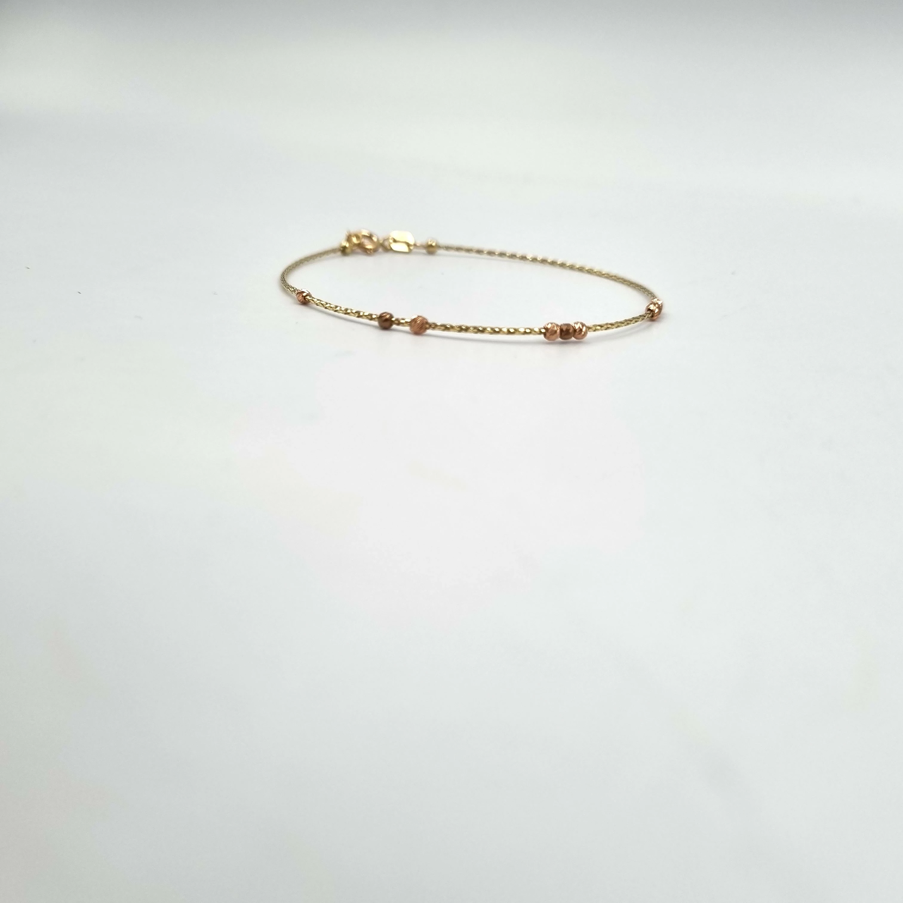 piekna-nowa-zlota-bransoletka-585-088g-kulki-19cm-rodzaj-wyrob-jubilerski