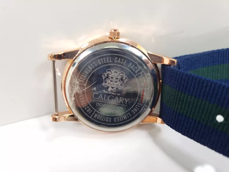 zegarek-calgary-102779354-q-ksztalt-koperty-okragla