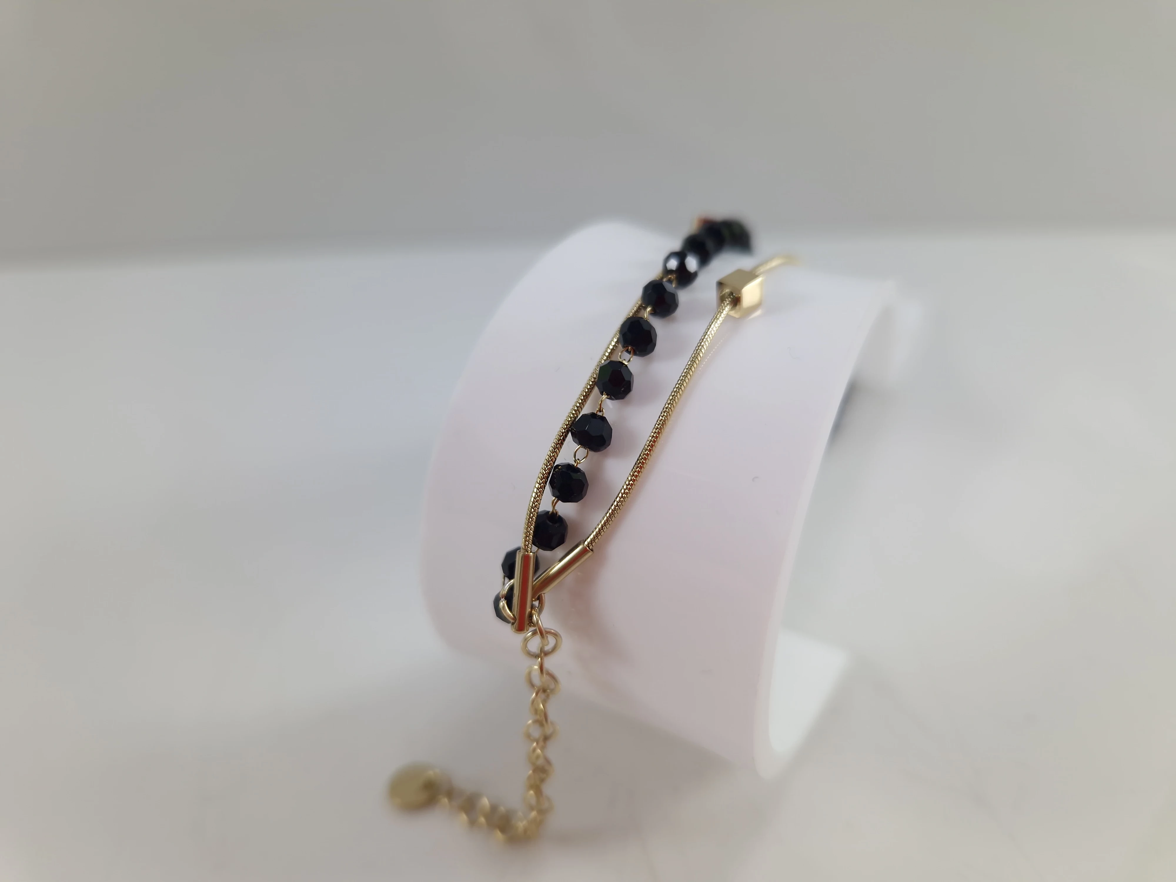 bransoletka-stal-316l-pozlacana-potrojna-koraliki-kostki-stan-nowy