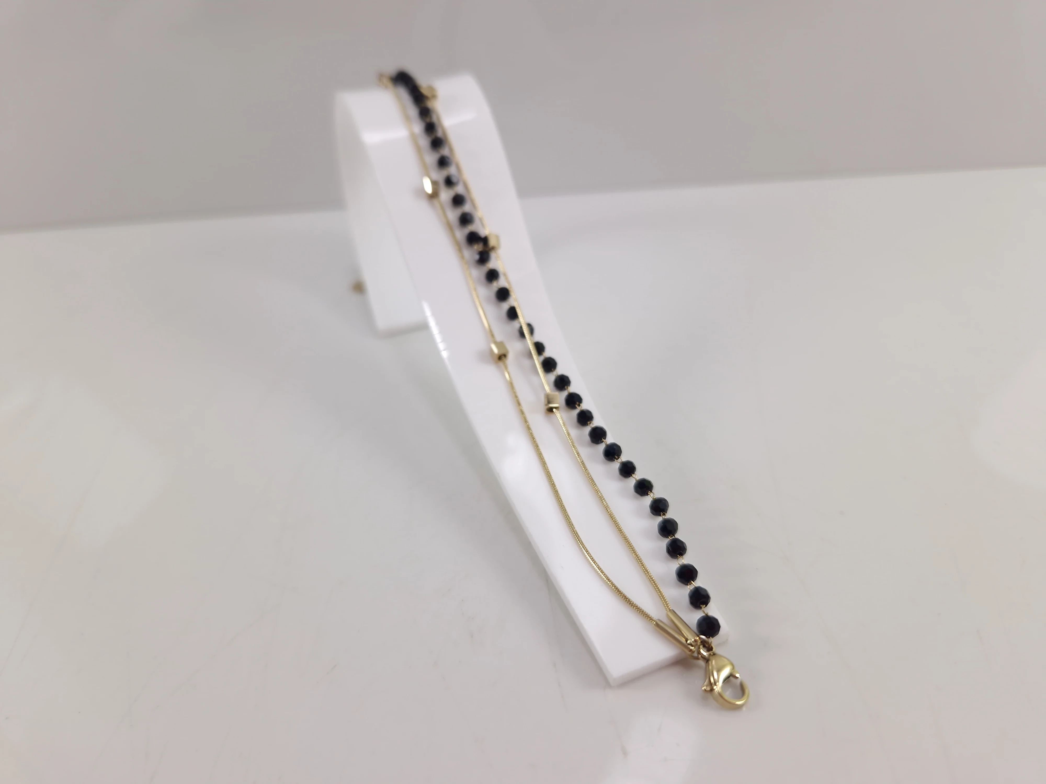 bransoletka-stal-316l-pozlacana-potrojna-koraliki-kostki-dabrowskiego-493-poznan-ska-x