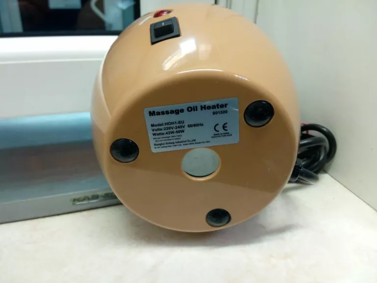 podgrzewacz-oleju-do-masazu-z-pojedyncza-butelka-product-id-89a687a7-2af3-49f5-a0b4-490d8d5361ad