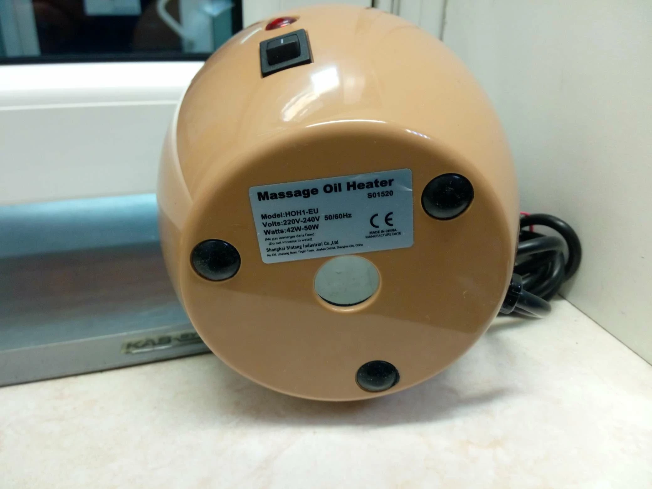 podgrzewacz-oleju-do-masazu-z-pojedyncza-butelka-product-id-89a687a7-2af3-49f5-a0b4-490d8d5361ad