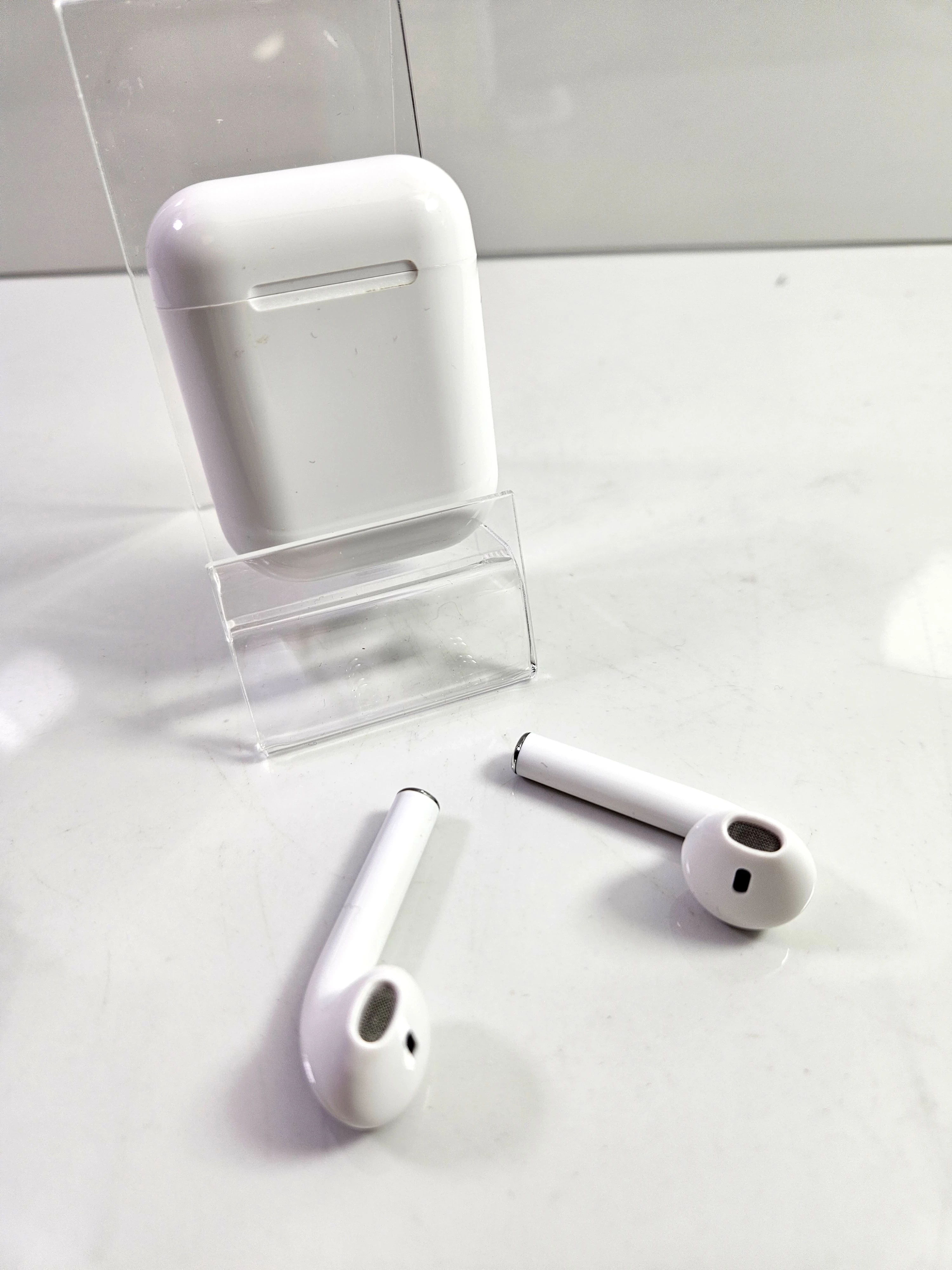 9-sluchawki-biale-tws-kurpinskiego-117-poznan-ska-x